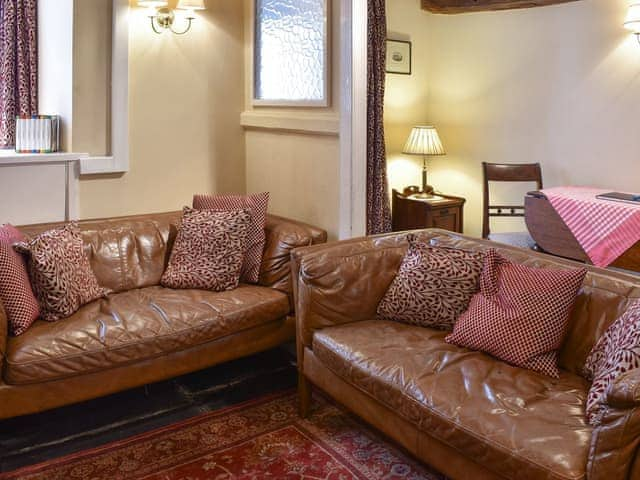 Comfortable seating within living area | Church Street, Ambleside