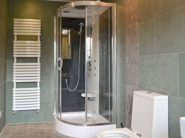 Family bathroom with bath and separate shower cubicle | West Fells Cottage, Rowrah, near Frizington