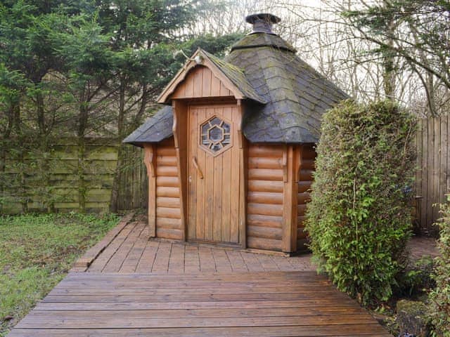 Finnish timber hobbit house with barbecue and firepit | West Fells Cottage, Rowrah, near Frizington