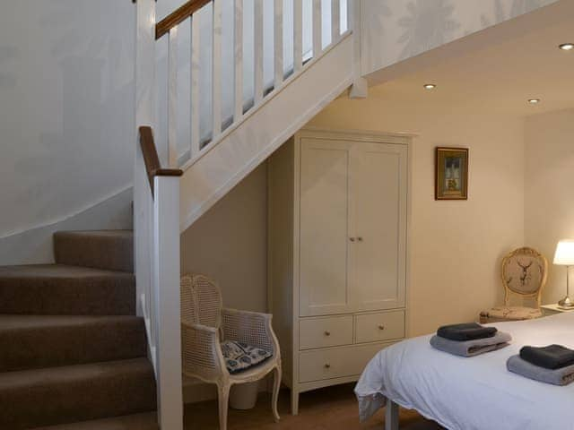 Double bedroom with stairs to en-suite | Stable Cottage, Chatton, near Wooler