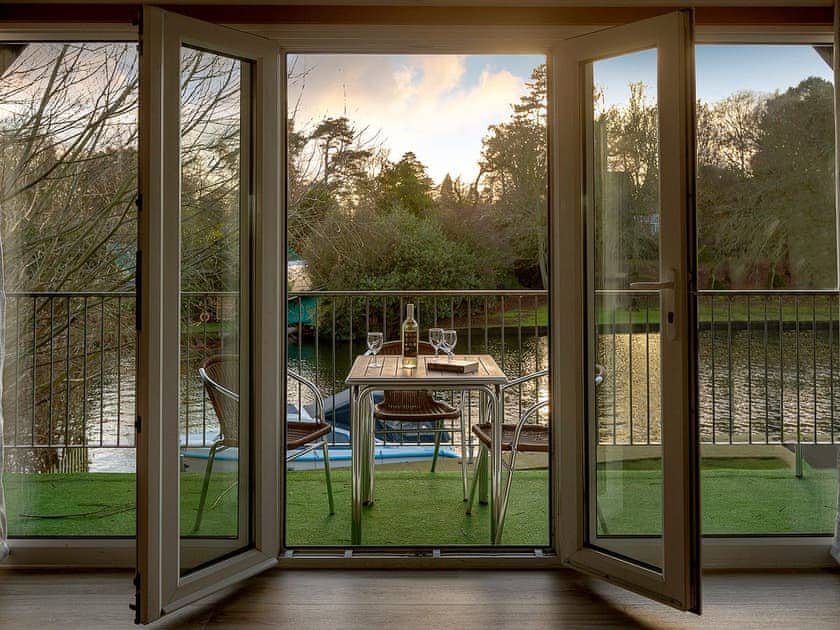 French doors from living area to balcony | Mallard - Daisy Broad Lodges, Wroxham