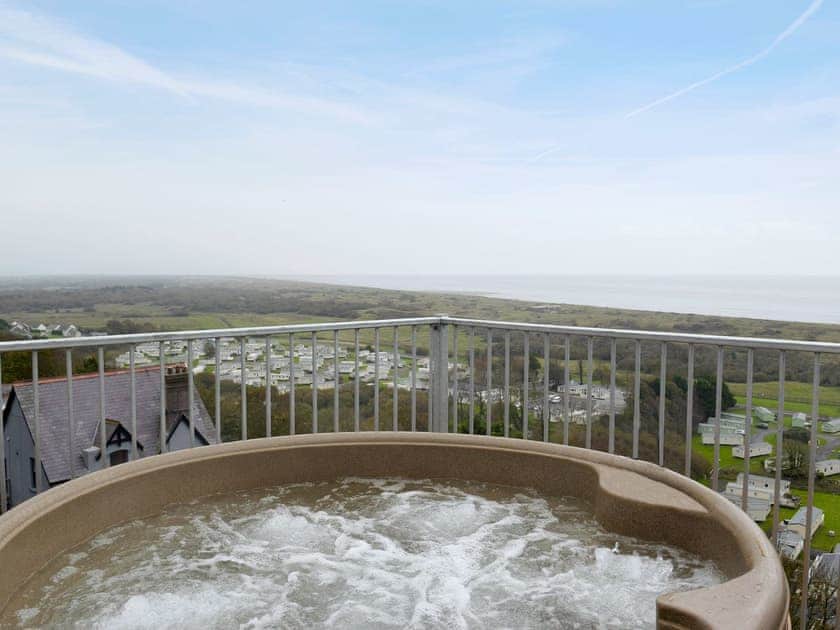 Hot tub with wonderful views | Caldy View - Pendine Manor Apartments, Pendine, near Laugharne