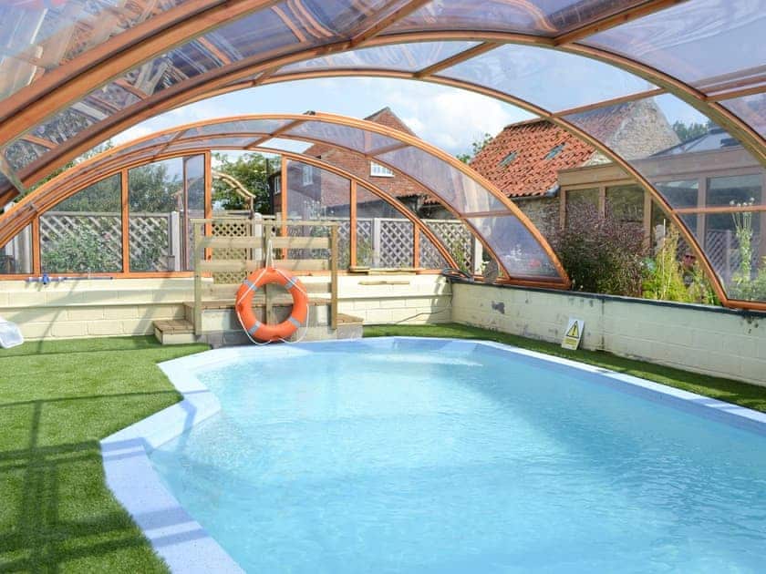 Shared outdoor pool within garden | The Mews, The Granary - Summertree Farm, near Thornton-le-Dale and Pickering