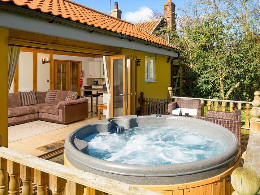 Relaxing hot tub | Owls Hoot - Serenity Cottages, Stoke Ash, near Eye