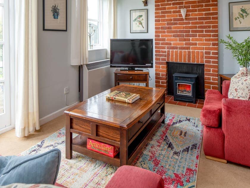 Comfortable living room | The Tack Room - Marshwood Manor Cottages, Bettiscombe, near Lyme Regis