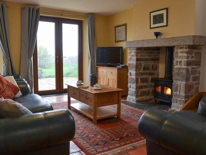 Cosy living room with wood burner | Orchard Cottage - Orchard Farm, Bideford