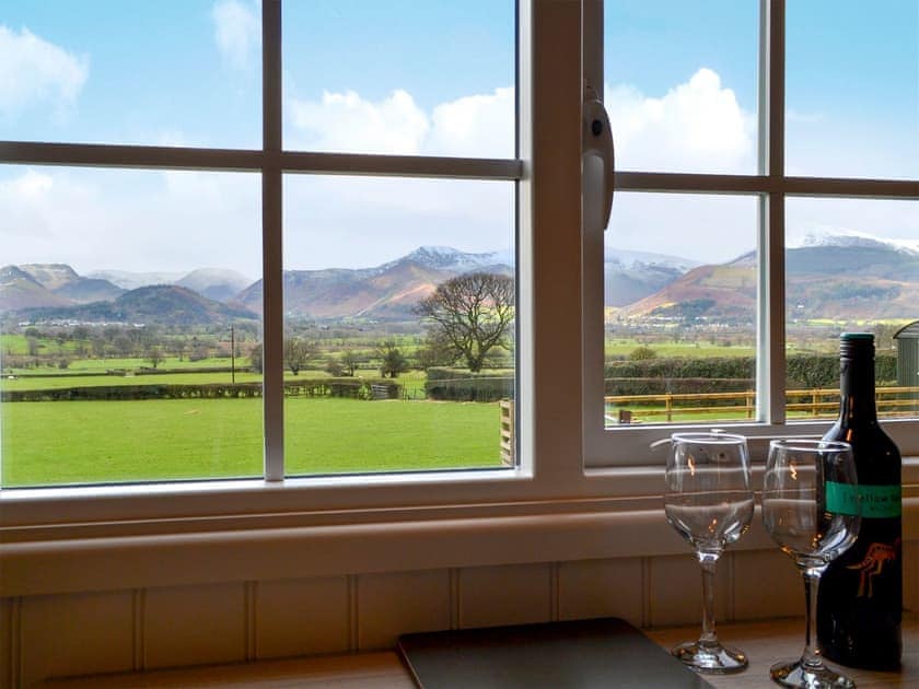 Intimate dining area with delightful views | Derwent - Lake View Shepherds Huts, Millbeck, near Keswick