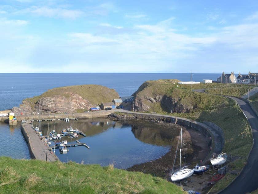 Situated high above the harbour with a commanding view out to sea | White Gables - Scott Holiday Cottages, Portknockie