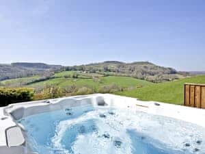 Private hot tub with stunning views | Woodland View Lodge, Axminster