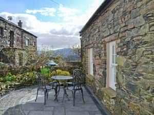 Peaceful courtyard with sitting-out area | Apple Barn, Applethwaite, near Keswick
