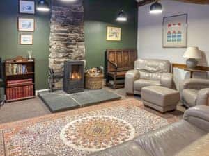 Living area featuring log burner | Little Knott, Blawith, near Coniston