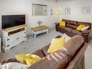 Living area | Oak Cottage - Graiglwyd Springs Holiday Cottages, Penmaenmawr, near Conwy