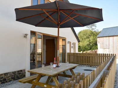 Sitting-out-area | South Barn - Monkleigh Court, Monkokehampton, near Okehampton