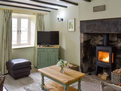 Charming living room with cosy wood burner | Fern Cottage, Bradwell