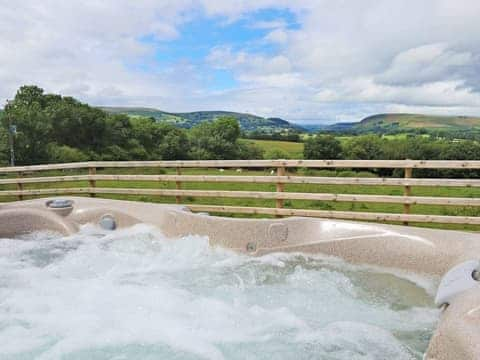 Relaxing hot tub with stunning views | Bryn Villa, Howey, near Llandrindod Wells