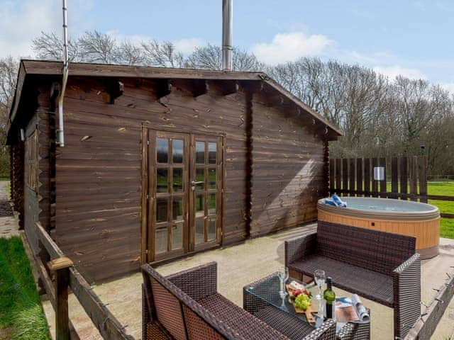 Delightful patio with hot tub and outdoor furniture | Halfmoon Wood - Readyfields Farm, Caunton, near Newark