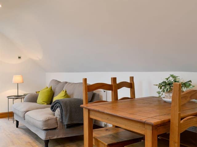 Open plan living space with wooden floor | Apple Barn, Applethwaite, near Keswick