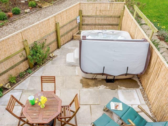 Lovely patio area with hot tub | The Hayloft - Meadow Farm, Hickling