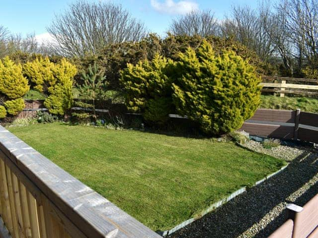 Small, enclosed, lawned garden | Tranquillity, Haverigg, near Millom