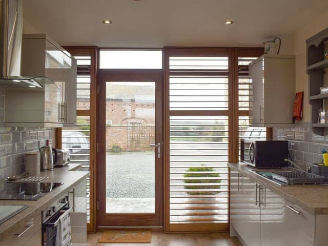 Well-equipped fitted kitchen | Skylark - Bird Barn Cottages, Lower Drayton, near Penkridge