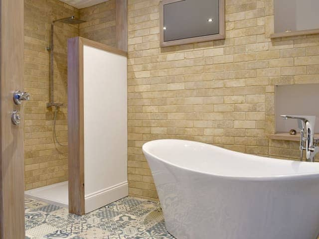 Bathroom with free-standing bath and shower area | Abbey View, Whitby