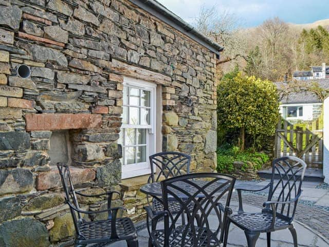 Peaceful courtyard with sitting-out area | Apple Barn, Applethwaite, near Keswick