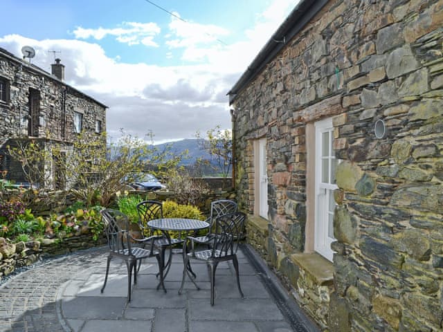 Peaceful courtyard with sitting-out area | Apple Barn, Applethwaite, near Keswick
