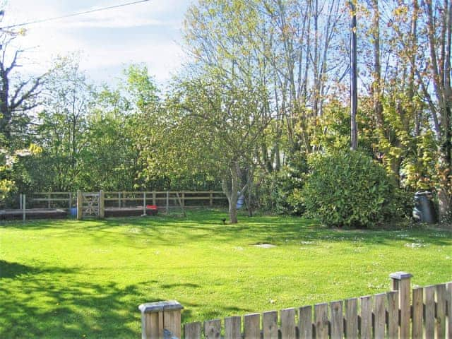 Peaceful garden area | The Granary - White House Farm Holiday Cottages, Knapton, near North Walsham