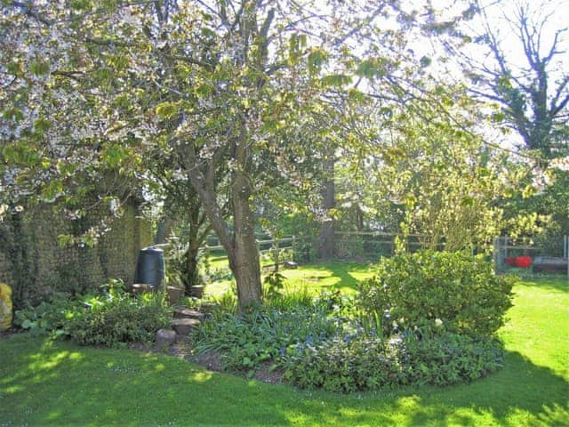 Peaceful garden area | The Granary - White House Farm Holiday Cottages, Knapton, near North Walsham