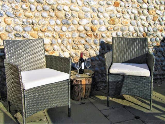 Inviting patio | Wallages Cottage - White House Farm Holiday Cottages, Knapton, near North Walsham