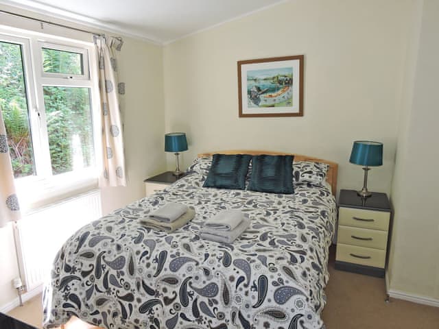 Charming double bedroom with en-suite shower room | Windermere Lodge,