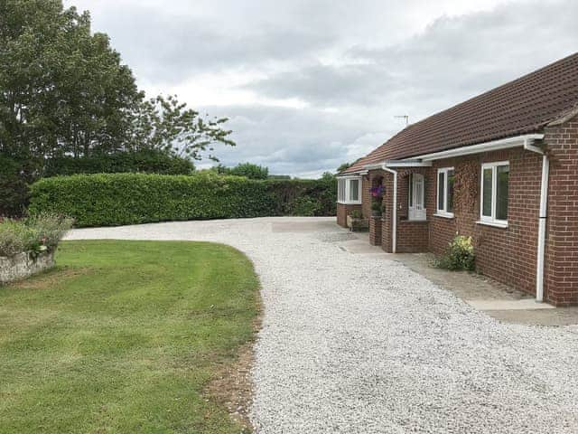 Gravelled parking area for up to four cars | Carr House, Cayton, Scarborough