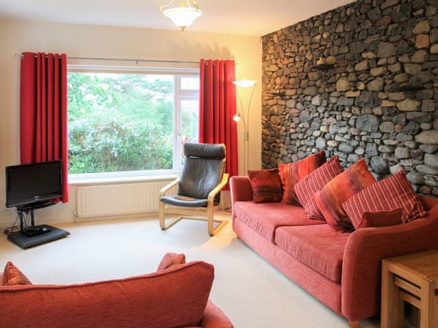 Spacious living room with feature exposed stone wall | Cobble Rigg, Threlkeld, near Keswick