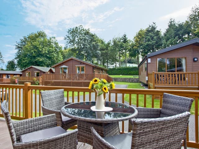 Sitting-out-area | Forest Glade Lodge, Lanlivery