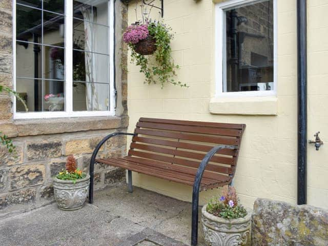 Outdoor seating on the patio | Front Row Cottage, Ovingham, near Prudhoe