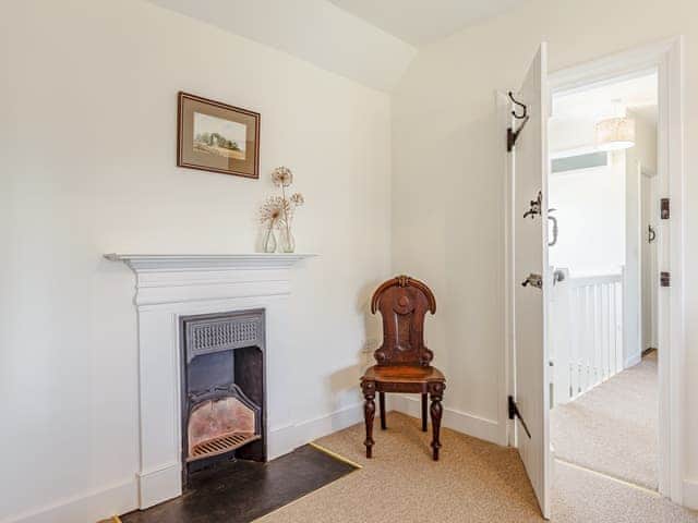 Super-king bedroom with door opening on to the Landing | Mark Farmhouse, Tillingham, near Southminster
