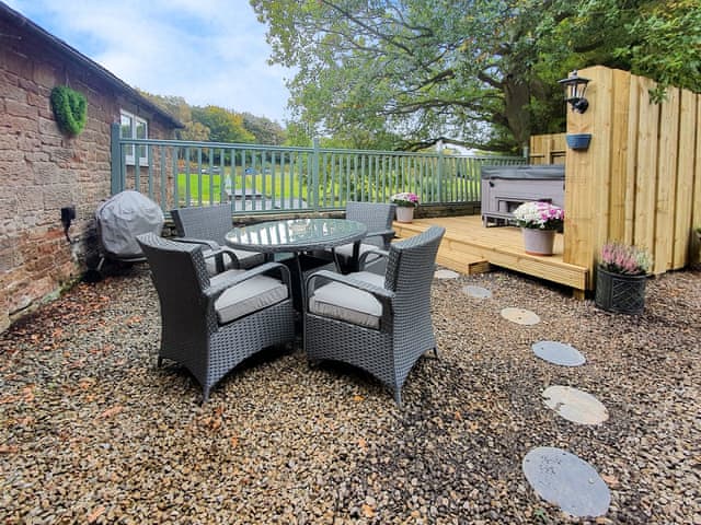 Outdoor area with hot tub | Lake View Cottage, Brampton, near Carlisle