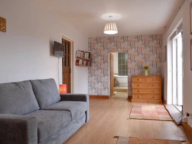 Garden room with pull-out sofa | Middle Farm, East Harling, near Thetford