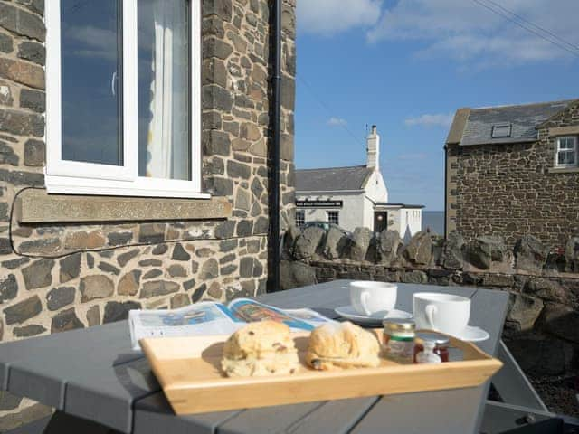 Sitting-out-area | Cuthbert Cottage, Craster