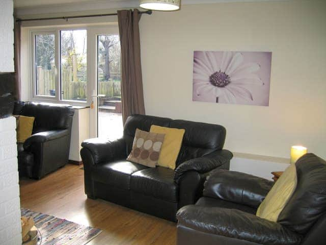 Inviting living room | Wallages Cottage - White House Farm Holiday Cottages, Knapton, near North Walsham