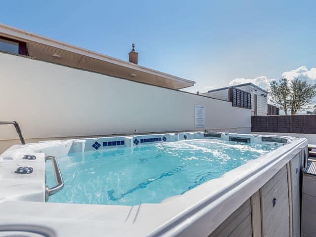 Hot tub | Sandbank - Gwbert Holiday Cottages, Gwbert, near Cardigan