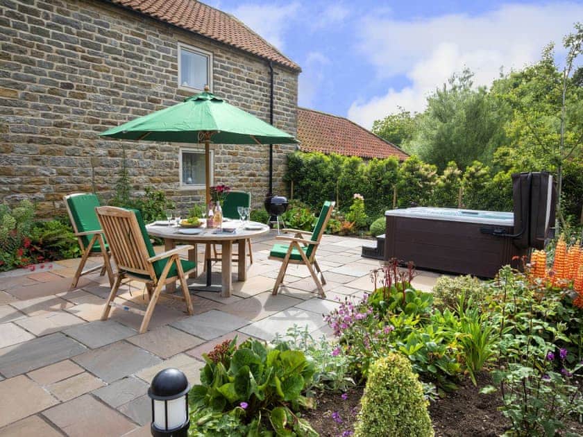 Beautiful private patio area with hot tub | Oak Cottage, Harwood Dale, near Scarborough