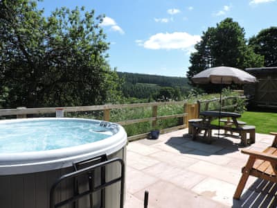 Hot tub with a view | Storey Farm Cottage, Hartoft, near Pickering