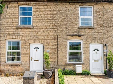 Exterior, cottage on the left | Red Kite Cottage, Stamford, near Easton-on-the-Hill