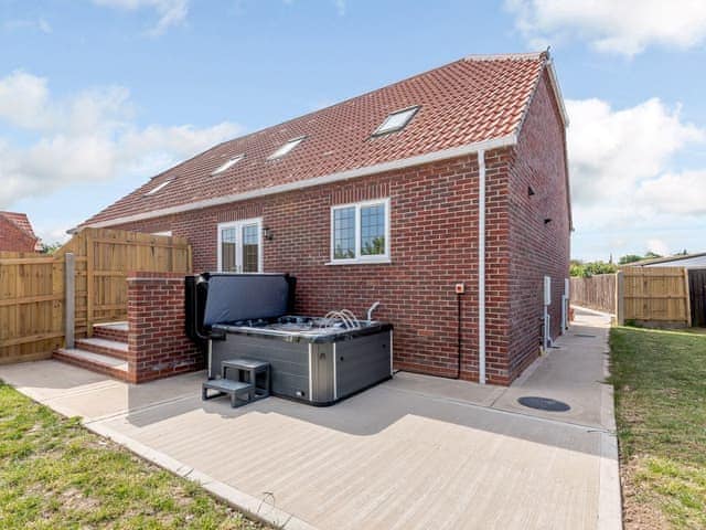 Hot tub at rear of the holiday home | 1 Dawson Park - Dawson Holiday Homes, Mablethorpe