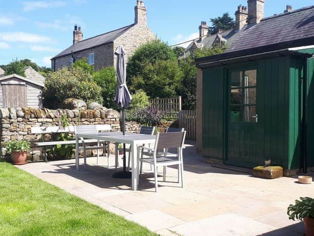 Patio area within the rear garden | Aydon Cottage, Aydon near Corbridge