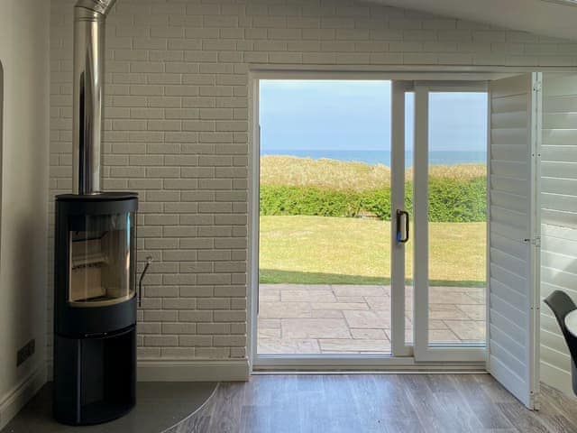 Sliding doors from living area to garden | Norfolk Broads and Coast, Winterton on Sea