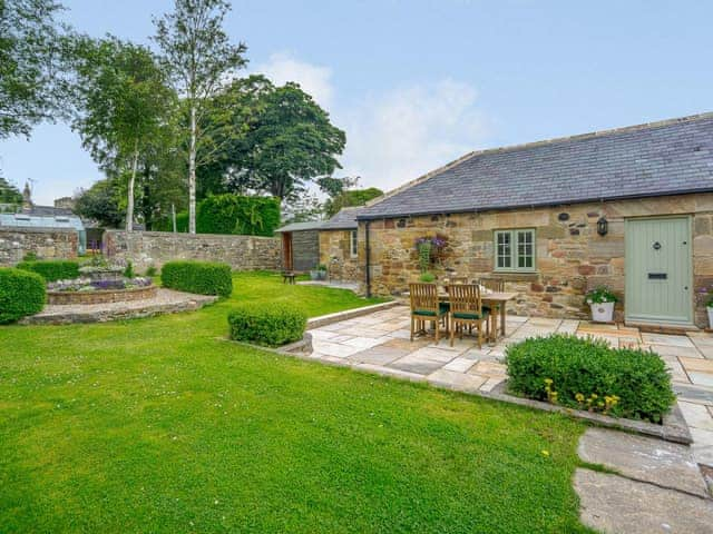 Exterior and garden | The Stable - Longhoughton Hall, Longhoughton