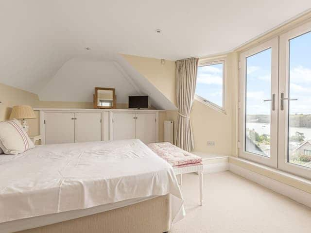 Master bedroom with superb water view | Highlands, St Mawes