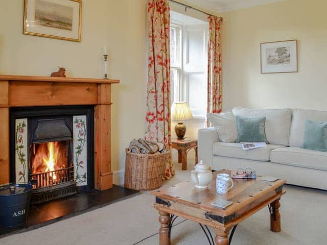 Warming open-fire within living room | Strathisla Farm Cottages- Islabank Farmhouse - Strathisla Farm Cottages, Meigle